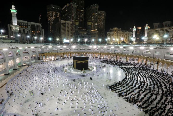 Muslim worshippers perform prayers around the Kaaba, in the Grand Mosque complex in Saudi Arabia's holy city of Makkah.