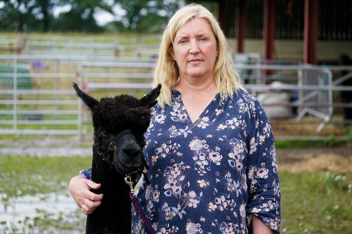 Geronimo the alpaca with owner Helen Macdonald