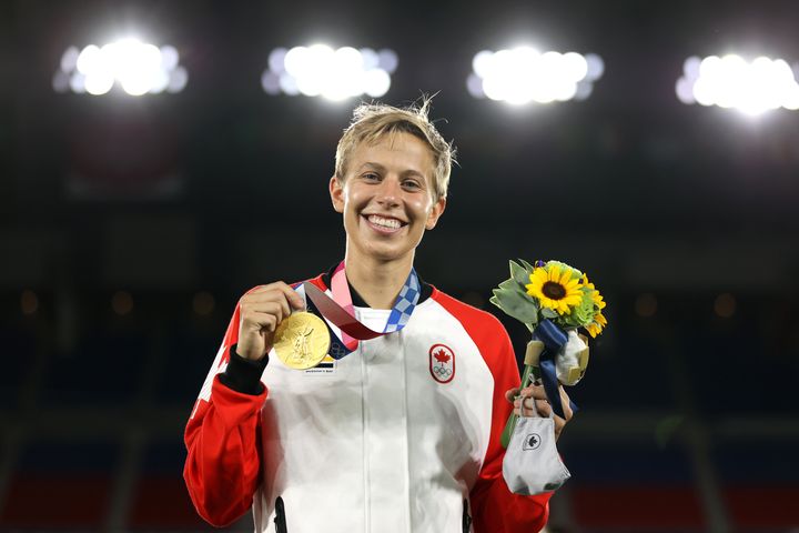 Gold medalist Quinn of Team Canada poses with their gold medal on Aug. 6 in Yokohama, Kanagawa, Japan. (Photo by Naomi Baker/Getty Images)