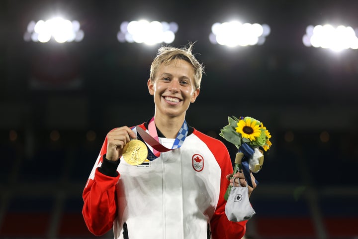 Gold medalist Quinn of Team Canada poses with their gold medal on Aug. 6 in Yokohama, Kanagawa, Japan. (Photo by Naomi Baker/Getty Images)