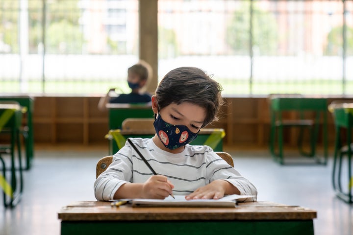 Wearing masks in public indoor spaces is an important part of keeping children safe this fall, experts say. 