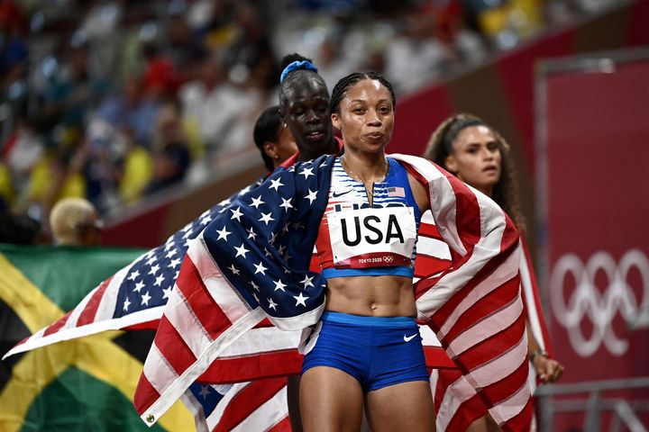 Team USA's Allyson Felix celebrates after winning the women's 4x400-meter relay final during the Tokyo Olympics.