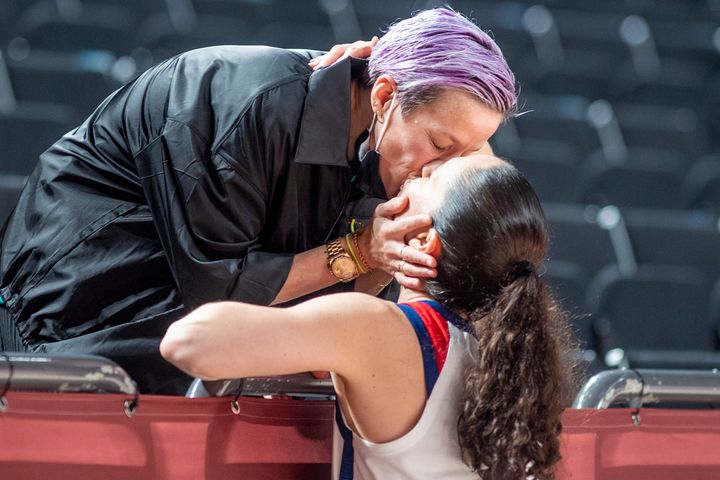 American basketball player Sue Bird is congratulated by her fiancée Megan Rapinoe after Bird won her fifth gold medal.