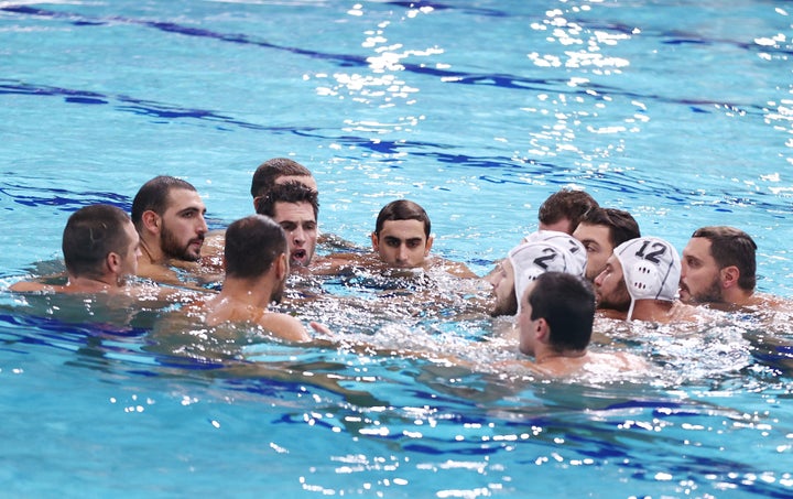 Tokyo 2020 Olympics - Water Polo - Men - Gold medal match - Greece v Serbia - Tatsumi Water Polo Centre, Tokyo, Japan â August 8, 2021. Greece's team members gather after the match REUTERS/Marko Djurica