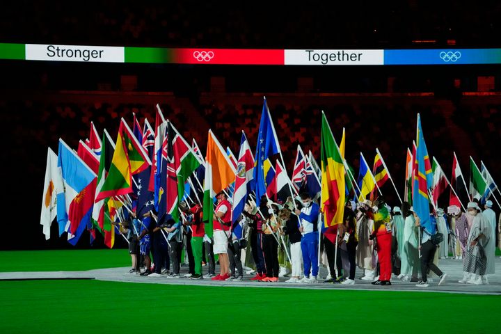 Aug 8, 2021; Tokyo, Japan; The nations' flags during the closing ceremony for the Tokyo 2020 Olympic Summer Games at Olympic Stadium. Mandatory Credit: Rob Schumacher-USA TODAY Sports