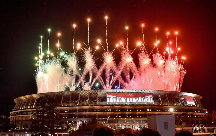 Fireworks go off around the Olympic Stadium during the closing ceremony. 