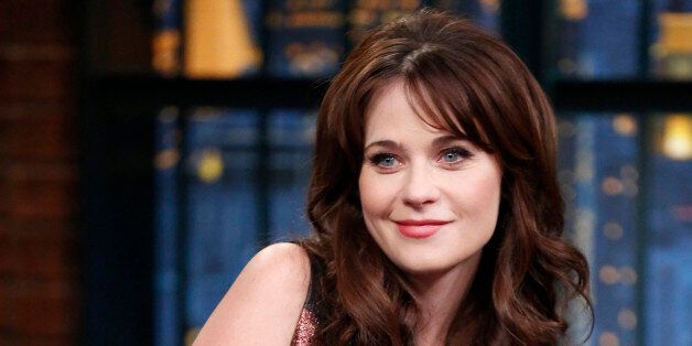 LATE NIGHT WITH SETH MEYERS -- Episode 0119 -- Pictured: Actress Zooey Deschanel during an interview on October 30, 2014 -- (Photo by: Lloyd Bishop/NBC/NBCU Photo Bank via Getty Images)