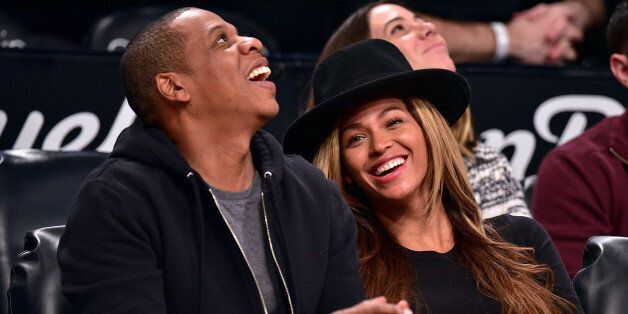 NEW YORK, NY - JANUARY 12: Jay-Z and Beyonce Knowles attend the Houston Rockets vs Brooklyn Nets game at Barclays Center on January 12, 2015 in New York City. (Photo by James Devaney/GC Images)