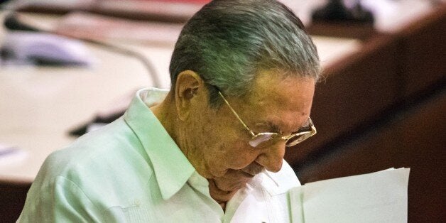 Cuban President Raul Castro gestures after his speech at the Parliament Annual Session, on December 20, 2014 in Havana. AFP PHOTO/ADALBERTO ROQUE (Photo credit should read ADALBERTO ROQUE/AFP/Getty Images)