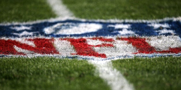 TAMPA, FL - DECEMBER 28: The NFL logo is seen painted on the playing field during an NFL football game between the New Orleans Saints and the Tampa Bay Buccaneers at Raymond James Stadium on December 28, 2014 in Tampa, Florida. (Photo by Alex Menendez/Getty Images)