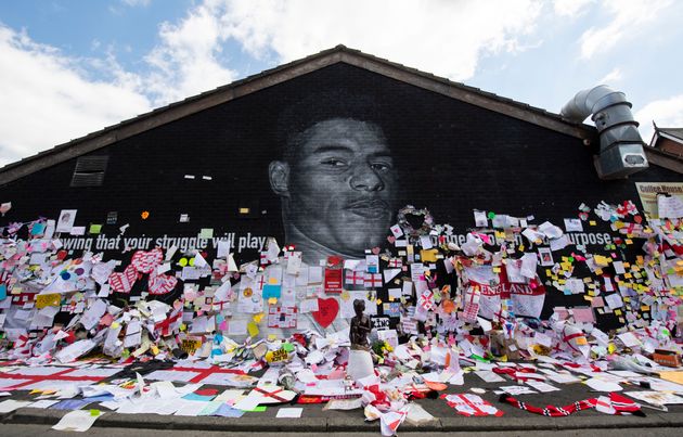 Tributes were laid out to Marcus Rashford after his mural was defaced in