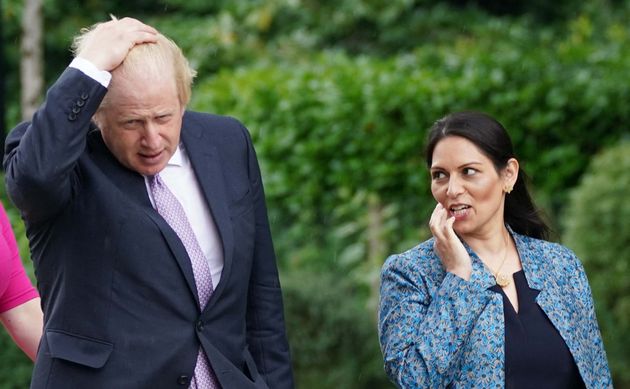 Boris Johnson and Priti Patel have been criticized for dealing with racist abuse of interest