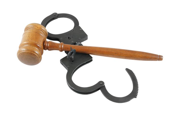 gavel and handcuffs isolated on ...