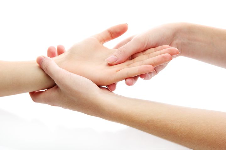 hand massage isolated on white