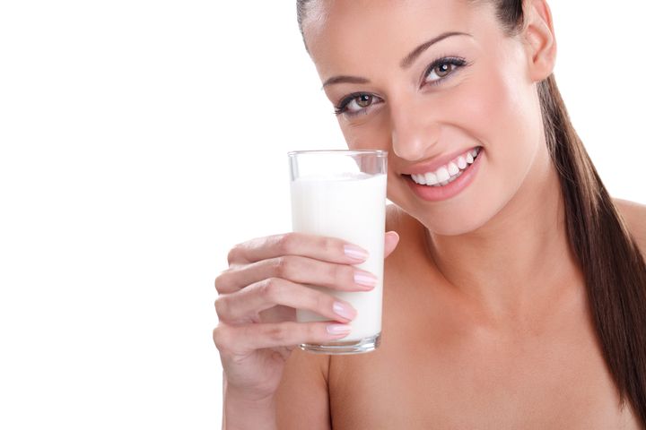 woman drinking milk. happy and...
