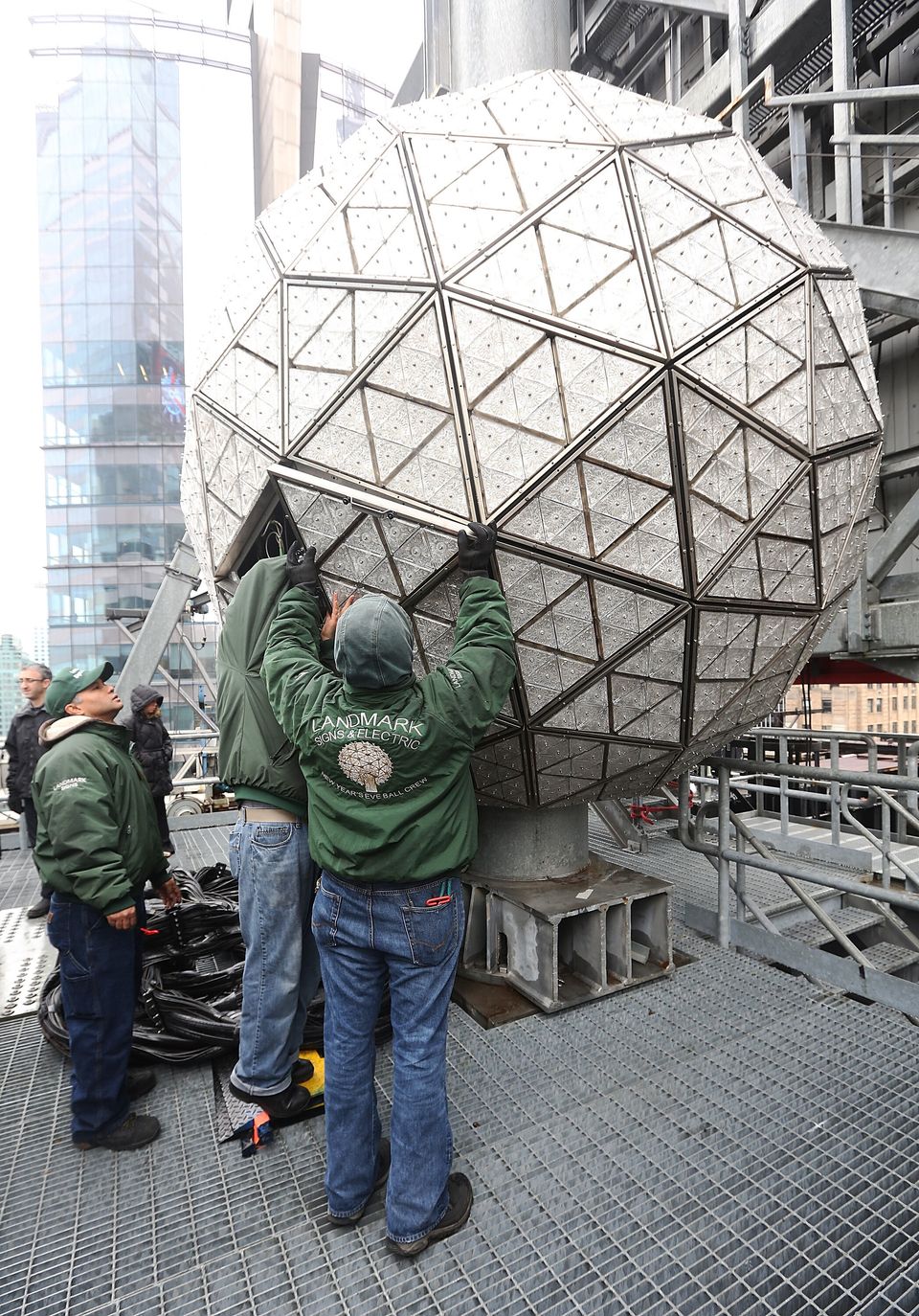 Workers Install Bulbs On Times Square New Year's Eve Ball