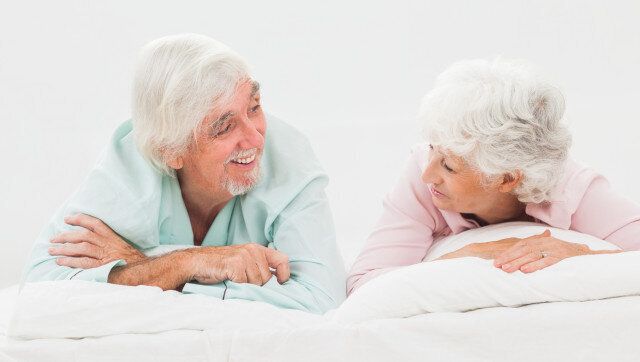 elderly happy couple looking at ...