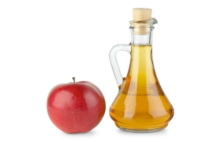 decanter with apple vinegar and ...