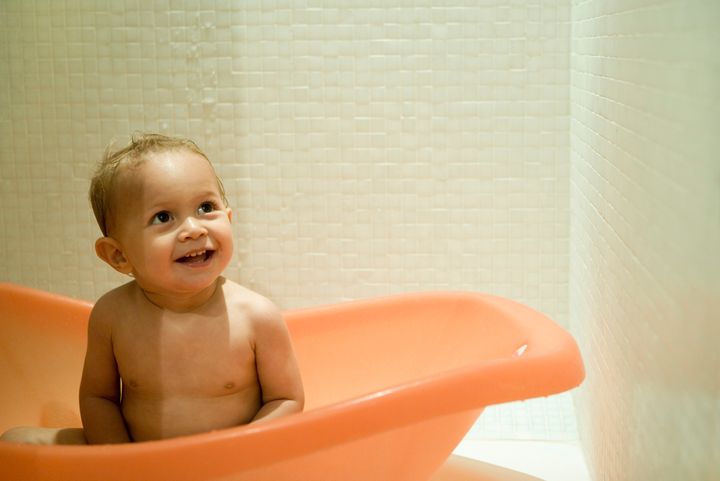 Baby boy taking a bath