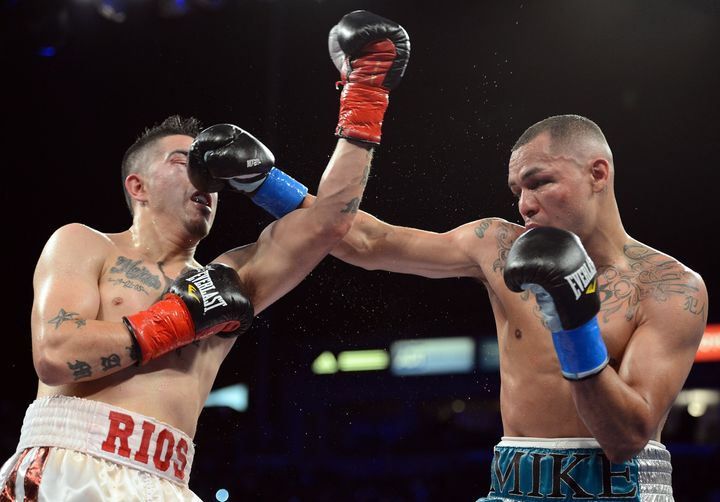 CARSON, CA - OCTOBER 13: Mike Alvarado punches Brandon Rios during the WBO Latino Super Lightweight Title fight at The Home Depot Center on October 13, 2012 in Carson, California. Rios would win with a seventh round TKO. (Photo by Harry How/Getty Images)