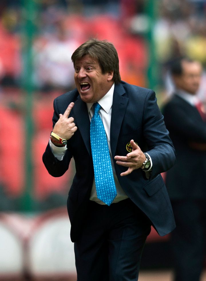 America's coach Miguel Herrera gestures, during their Mexican Clausura Tournament football match against Toluca, in Mexico City, on February 16, 2013. AFP PHOTO/RONALDO SCHEMIDT (Photo credit should read Ronaldo Schemidt/AFP/Getty Images)