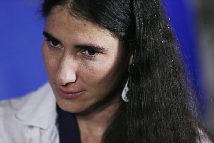 MIAMI, FL - APRIL 01: Cuban blogger and independent journalist Yoani Sanchez participates in an event at the Miami Dade College’s Freedom Tower on April 1, 2013 in Miami, Florida. Sanchez's visit to Miami, the heart of the Cuban exile community, happens as she takes part in a world tour to speak about life in Cuba. (Photo by Joe Raedle/Getty Images)