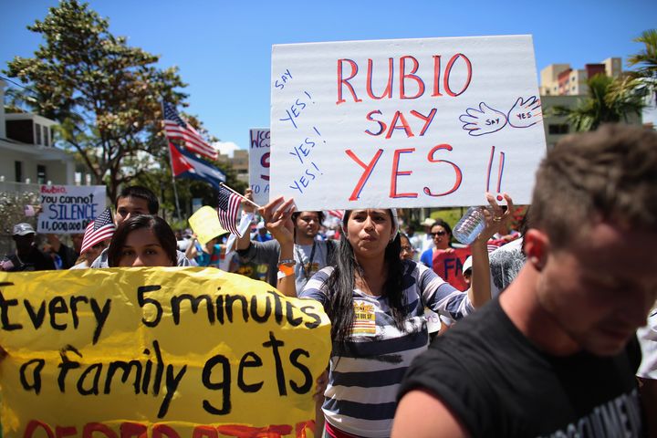 MIAMI, FL - APRIL 06: People participate in a protest march that organizers said was an attempt to get the U.S. Congress to say yes to immigration reform on April 6, 2013 in Miami, Florida. The marchers were calling for a new immigration system with a real and inclusive path to citizenship for 11 million aspiring Americans, and to keep families together. (Photo by Joe Raedle/Getty Images)