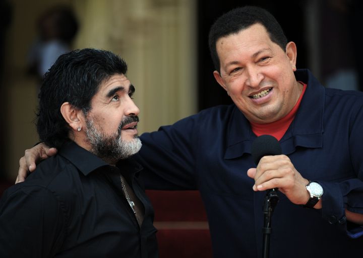 Venezuelan President Hugo Chavez (R) talks with Argentina's national football team coach Diego Maradona (L), at a press conference during which Chavez announced that Venezuela breaks relations with Colombia, at Miraflores presidential palace in Caracas, on July 22, 2010. Chavez said Thursday his government has broken off diplomatic relations with Colombia after it charged that Colombian guerrilla leaders were in Venezuela. AFP PHOTO/Juan BARRETO (Photo credit should read JUAN BARRETO/AFP/Getty Images)