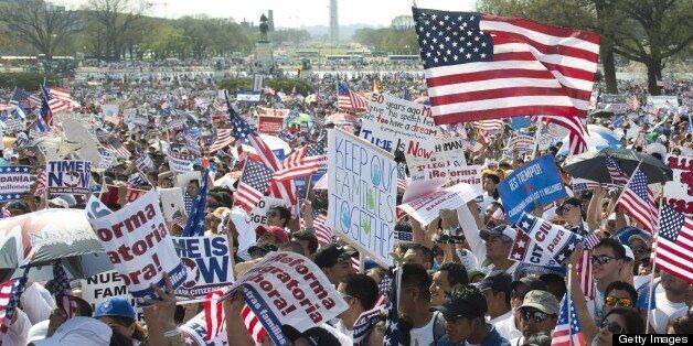 Tens of thousands of immigration reform supporters march in the 'Rally for Citizenship' on the West Lawn of the US Capitol in Washington, DC, on April 10, 2013. AFP PHOTO / Saul LOEB (Photo credit should read SAUL LOEB/AFP/Getty Images)