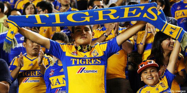 MONTERREY, MEXICO - NOVEMBER 10: Fans of Tigres cheer for their team during a match between Tigres and America as part of the Apertura 2012 Liga MX at Universitario Stadium on November 10, 2012 in Monterrey, Mexico. (Photo by AlfredoLopez/JamMedia/LatinContent/Getty Images)