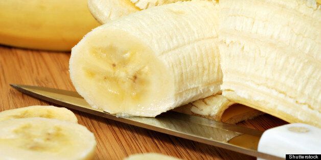 freshly sliced banana with...