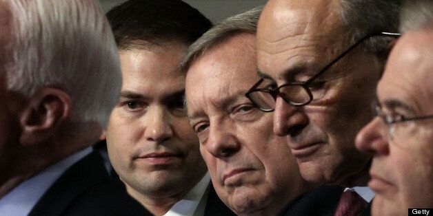 WASHINGTON, DC - APRIL 18: (L-R) U.S. Marco Rubio (R-FL), Sen. Richard Durbin (D-IL), Sen. Charles Schumer (D-NY), and Sen. Bob Menendez (D-NJ) listen during a news conference on immigration reform April 18, 2013 on Capitol Hill in Washington, DC. The senators discussed on the 'Border Security, Economic Opportunity, and Immigration Modernization Act' that have been released on Wednesday. (Photo by Alex Wong/Getty Images)