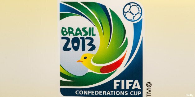 The logo of the FIFA Confederations Cup is seen during the press conference at Pacaembu stadium in Sao Paulo, Brazil on November 8, 2012. FIFA confirmed 6 venues in Belo Horizonte, Brasilia, Fortaleza, Recife, Rio de Janeiro and Salvador. FIFA also revealed special price tickets category (T4) for Brazilians only including a discount system for students, elders and disabled. AFP PHOTO/Yasuyoshi CHIBA (Photo credit should read YASUYOSHI CHIBA/AFP/Getty Images)