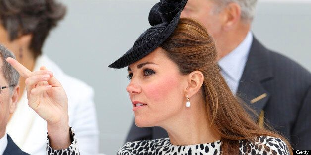 SOUTHAMPTON, UNITED KINGDOM - JUNE 13: (EMBARGOED FOR PUBLICATION IN UK NEWSPAPERS UNTIL 48 HOURS AFTER CREATE DATE AND TIME) Catherine, Duchess of Cambridge attends the naming ceremony for the new Princess Cruises ship 'Royal Princess' on June 13, 2013 in Southampton, England. The Duchess of Cambridge, as the ship's godmother, officially named the Royal Princess with a traditional blessing involving smashing a bottle of Champagne over the ship's hull in what is expected to her final solo engagement before the birth of her and Prince William's child. (Photo by Max Mumby/Indigo/Getty Images)