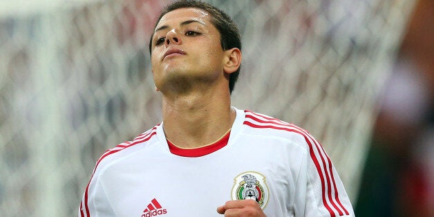 BELO HORIZONTE, BRAZIL - JUNE 22: Javier Hernandez of Mexico celebrates after scoring a goal in the second half against Japan during the FIFA Confederations Cup Brazil 2013 Group A match between Japan and Mexico at Estadio Mineirao on June 22, 2013 in Belo Horizonte, Brazil. (Photo by Alex Livesey - FIFA/FIFA via Getty Images)