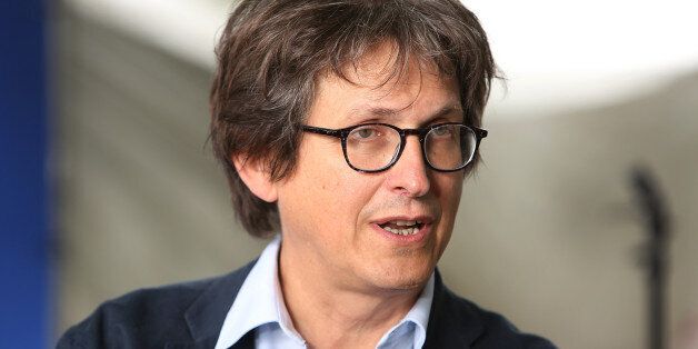 EDINBURGH, SCOTLAND - AUGUST 22: Alan Rusbridger, editor of The Guardian, and author of 'Play It Again', appears at a photocall prior to an event at the 30th Edinburgh International Book Festival, on August 22, 2013 in Edinburgh, Scotland. The Edinburgh International Book Festival is the worlds largest annual literary event, and takes place in the city which became a UNESCO City of Literature in 2004. (Photo by Jeremy Sutton-Hibbert/Getty Images)