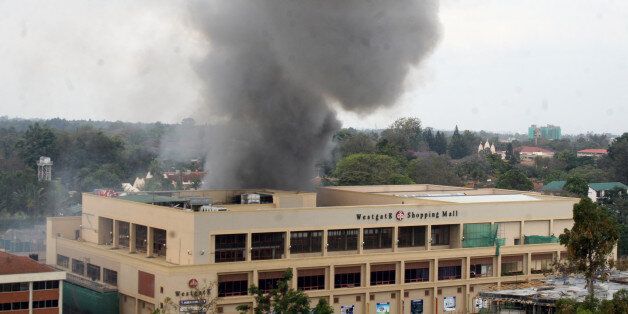 NAIROBI, KENYA - SEPTEMBER 23: (SOUTH AFRICA OUT) Heavy smoke is seen from the site of the terrorist attack, Westgate Mall, on September 23, 2013 in Nairobi, Kenya. The attack occurred on Saturday, 10-15 gunmen from the extremist group Al-Shabab entered the mall and opened fire at random on shoppers; 68 deaths have been confirmed. (Photo by Wiiliam Oeri/Nation Media/Gallo Images/Getty Images)
