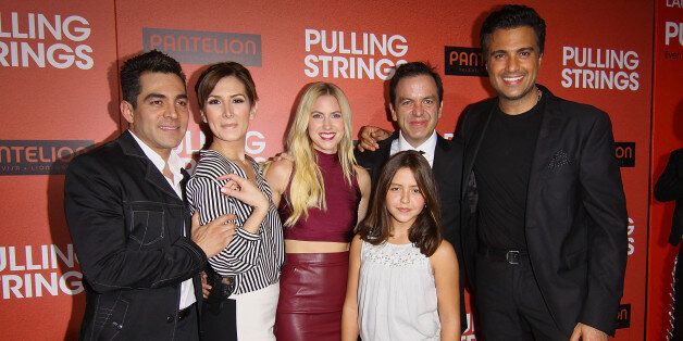 LOS ANGELES, CA - OCTOBER 03: (L-R) Actors Omar Chaparro, Aurora Papile, Laura Ramsey, Filmmaker Pitipol Ybarra and Actor Jaime Camil attend Los Angeles Premiere of 'Pulling Strings' at Regal Cinemas L.A. Live on October 3, 2013 in Los Angeles, California. (Photo by JC Olivera/WireImage)