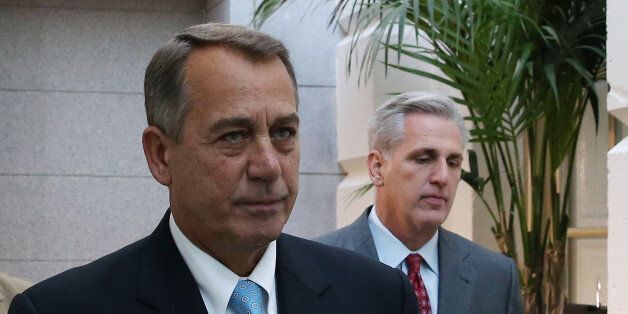 WASHINGTON, DC - OCTOBER 15: House Speaker John Boehner (R-OH) (L) and House Majority Whip Kevin McCarthy (R-CA) walk to a Republican caucus meeting at the U.S. Capitol, October 15, 2013 in Washington, DC. With the government shutdown going into the fifttenth day and the deadline for raising the debt ceiling fast approaching, Democrats and Republicans are working to come to an agreement soon on passing a budget. (Photo by Mark Wilson/Getty Images)