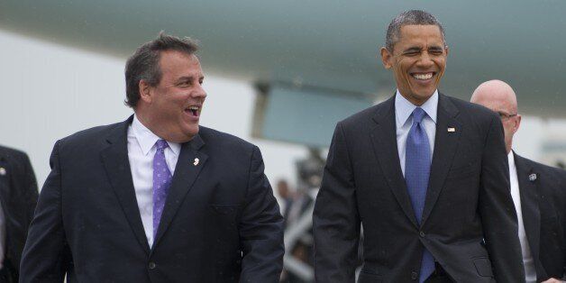 US President Barack Obama walks with New Jersey Governor Chris Christie (L) after arriving on Air Force One at Joint Base McGuire-Dix in New Jersey on May 28, 2013. Obama is traveling to the New Jersey shore to view rebuilding efforts following last year's Hurricane Sandy. AFP PHOTO / Saul LOEB (Photo credit should read SAUL LOEB/AFP/Getty Images)