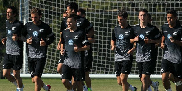 LOS ANGELES, CA - NOVEMBER 10: (L-R) Ivan Vicelich, Jeremy Brockie, Chris James, Tony Lochhead, Storm Roux and Bill Tuiloma of the New Zealand national jog during their training session at StubHub Center on November 10, 2013 in Los Angeles, California. (Photo by Victor Decolongon/Getty Images)