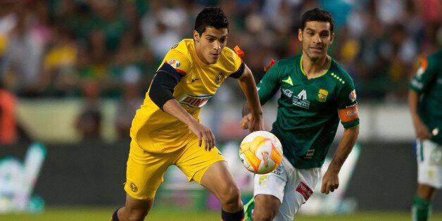 LEON, MEXICO - APRIL 13: Rafael Marquez (R) of Leon struggles for the ball with Raul Jimenez (L) of America during a match between Leon and America as part of Clausura 2013 Liga MX at Camp Nou Stadium on April 13, 2013 in Leon, Mexico. (Photo by Gerardo Zavala/JamMedia/LatinContent/Getty Images)