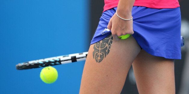 MELBOURNE, AUSTRALIA - JANUARY 15: Detail of tattoo on the leg of Karolina Pliskova of the Czech Republic in her second round match against Daniela Hantuchova of Slovakia during day three of the 2014 Australian Open at Melbourne Park on January 15, 2014 in Melbourne, Australia. (Photo by Mark Kolbe/Getty Images)