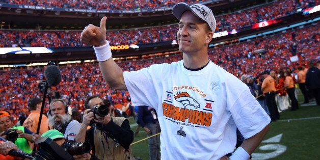 DENVER, CO - JANUARY 19: Peyton Manning #18 of the Denver Broncos celebrates after they defeated the New England Patriots 26 to 16 during the AFC Championship game at Sports Authority Field at Mile High on January 19, 2014 in Denver, Colorado. (Photo by Doug Pensinger/Getty Images)