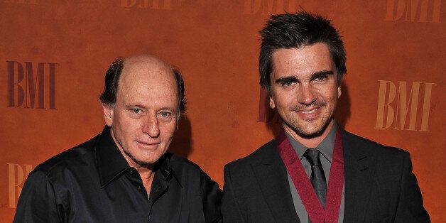 Fernan Martinez and Juanes pose with the President's Award at the 2010 BMI Latin Awards at the Bellagio on March 4, 2010 in Las Vegas, Nevada.
