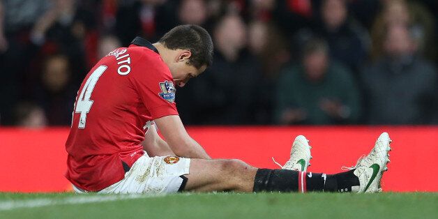MANCHESTER, ENGLAND - JANUARY 22: Javier 'Chicharito' Hernandez of Manchester United shows his disappointment at a missed chance during the Capital One Cup semi-final second leg at Old Trafford on January 22, 2014 in Manchester, England. (Photo by Matthew Peters/Man Utd via Getty Images)