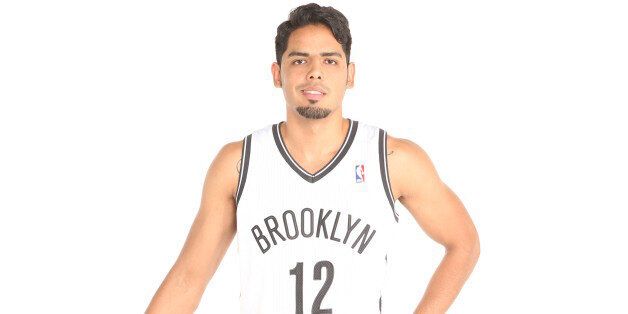 BROOKLYN, NY - SEPTEMBER 30: Jorge Gutierrez #12 of the Brooklyn Nets poses for a portrait during Media Day at the Barclays Center in Brooklyn, NY. NOTE TO USER: User expressly acknowledges and agrees that, by downloading and or using this photograph, User is consenting to the terms and conditions of the Getty Images License Agreement. Mandatory Copyright Notice: Copyright 2013 NBAE (Photo by Nathaniel S. Butler/NBAE via Getty Images)