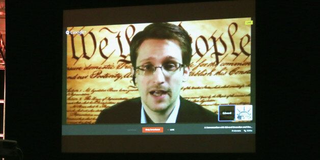 AUSTIN, TX - MARCH 10: NSA whistleblower Edward Snowden speaks via videoconference at 'Why Didn't a Tech Journalist Break PRISM?' during the 2014 SXSW Music, Film + Interactive Festival at Austin Convention Center on March 10, 2014 in Austin, Texas. (Photo by Tammy Perez/Getty Images for SXSW)