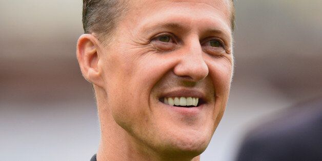 HAMBURG, GERMANY - SEPTEMBER 08: Formula 1 legend Michael Schumacher looks on during the day of the legends event at the Millentor stadium on September 8, 2013 in Hamburg, Germany. (Photo by Stuart Franklin/Bongarts/Getty Images)