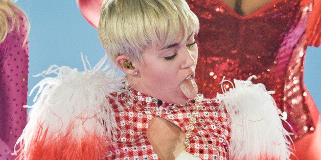 ROSEMONT, IL - MARCH 07: Miley Cyrus performs at Allstate Arena on March 7, 2014 in Rosemont, Illinois. (Photo by Timothy Hiatt/WireImage)